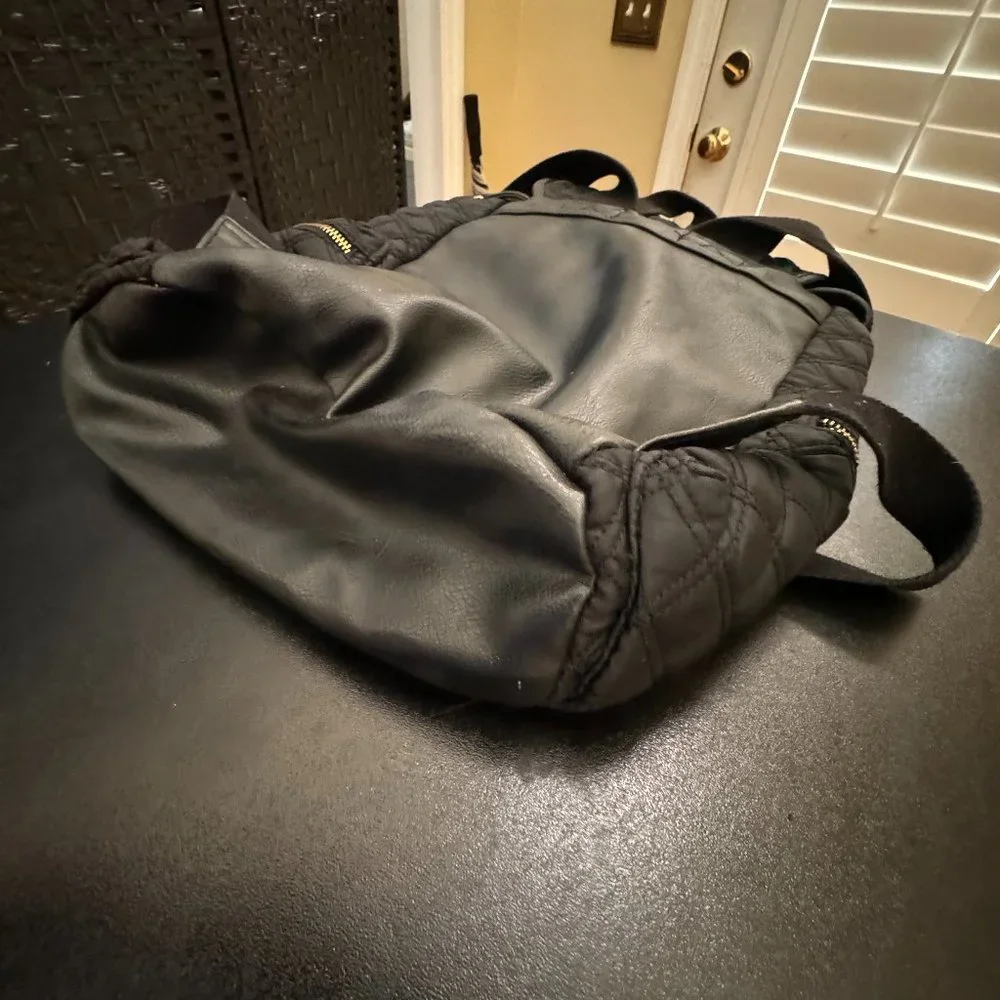 Juicy Couture black quilted backpack with adjustable straps